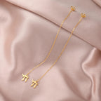 Boucles d'oreilles pendantes avec le symbole de vie juive Chai or