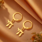 Boucles d'oreilles pendantes avec le symbole juif Chai or