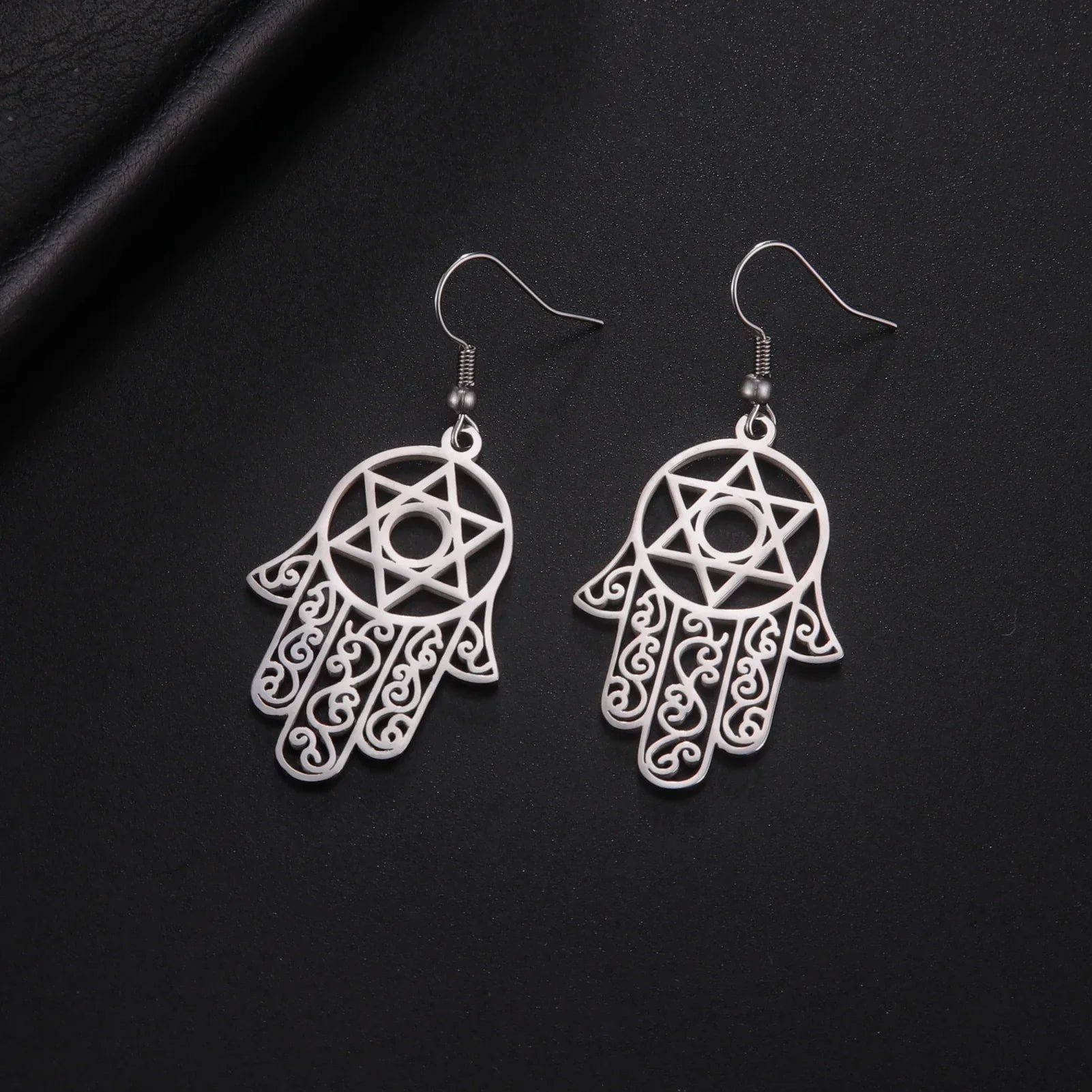 Boucles d'oreilles pendantes avec le symbole juif de protection main de Fatma et étoile de David argent