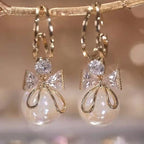 Dangling Earrings with Butterfly Knot and Pearl