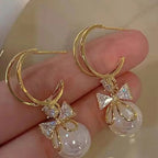 Dangling Earrings with Butterfly Knot and Pearl