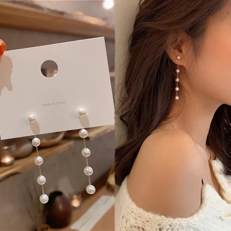Dangling Earrings with White Pearls