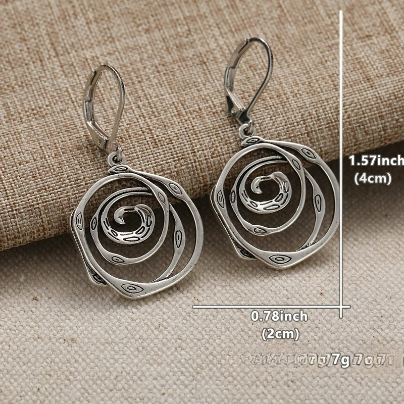 Boucles d'oreilles pendantes avec spirale ciselée