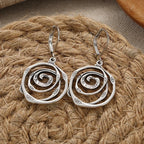 Boucles d'oreilles pendantes avec spirale ciselée