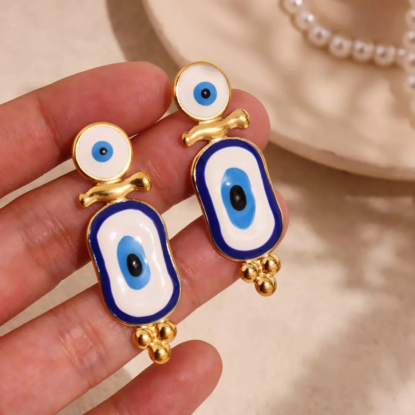 Ethnic Blue Eye Gold Dangle Earrings