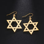 Boucles d'oreilles pendantes hexagonales avec le symbole juif de l'étoile de David or
