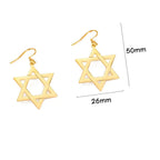 Boucles d'oreilles pendantes hexagonales avec le symbole juif de l'étoile de David or