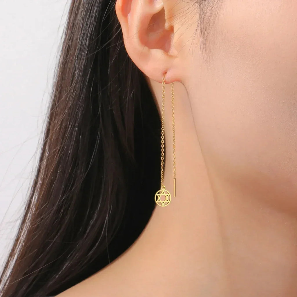 Boucles d'oreilles pendantes longues avec l'étoile de David symbole juif rond or