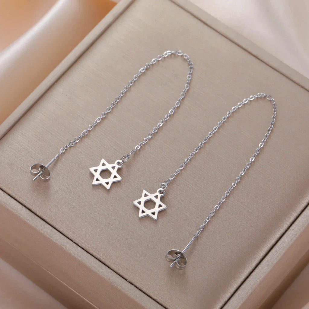 Boucles d'oreilles pendantes longues avec l'étoile de David symbole juif argent