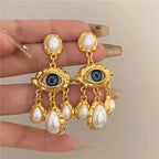 Blue Eye and Gold Beads Dangling Earrings