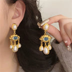 Blue Eye and Gold Beads Dangling Earrings