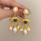Blue Eye and Gold Beads Dangling Earrings