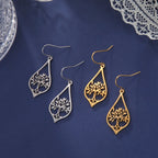Oval Hanging Earrings Tree of Life gold