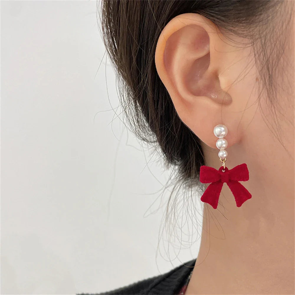 Dangling Earrings with Pearls and Red Bows