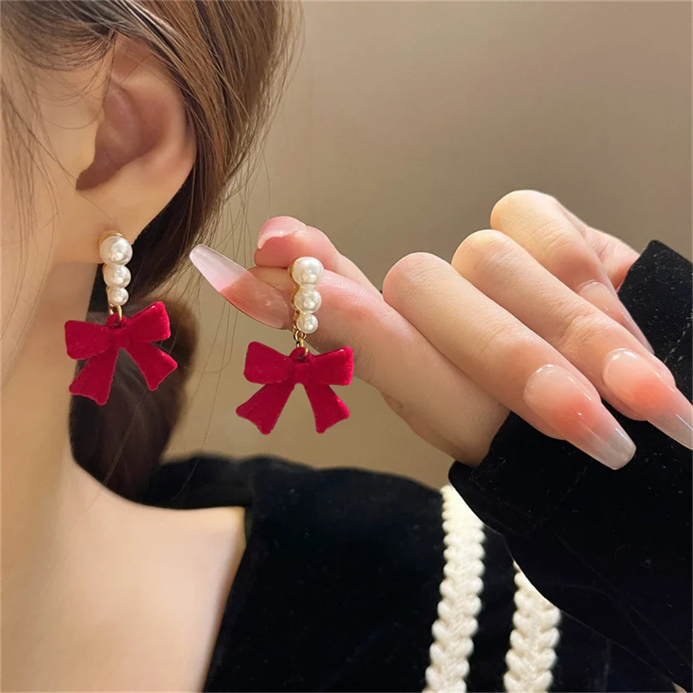Dangling Earrings with Pearls and Red Bows