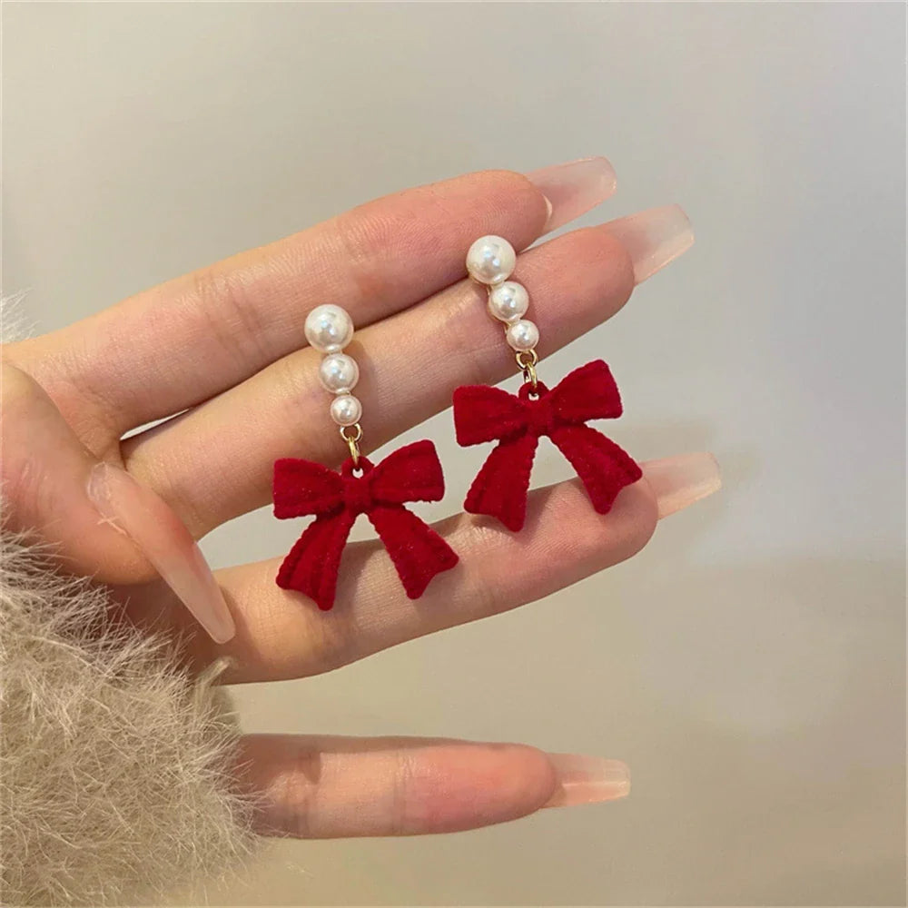 Dangling Earrings with Pearls and Red Bows
