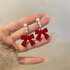Dangling Earrings with Pearls and Red Bows
