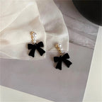 Dangling Earrings with Pearls and Black Bows