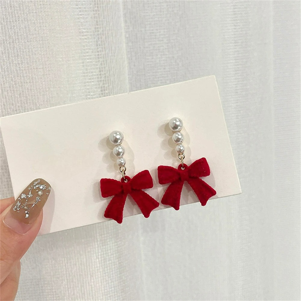 Dangling Earrings with Pearls and Red Bows