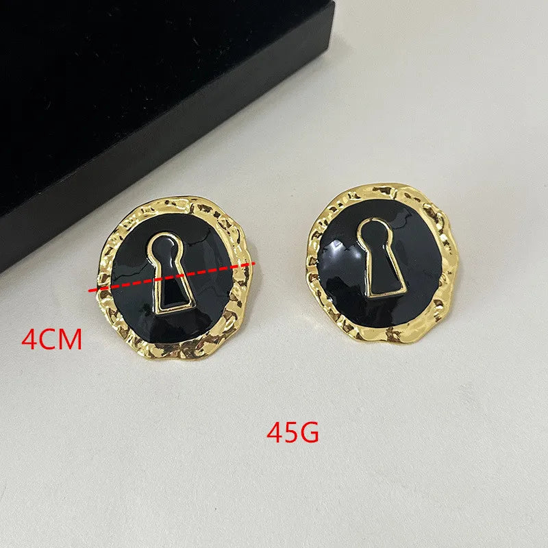 Boucles d'oreilles rondes clef