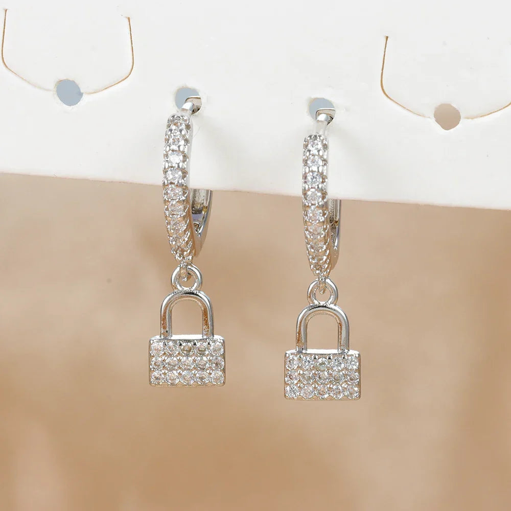 Boucles d'oreilles créoles clef et cadenas avec strass argent