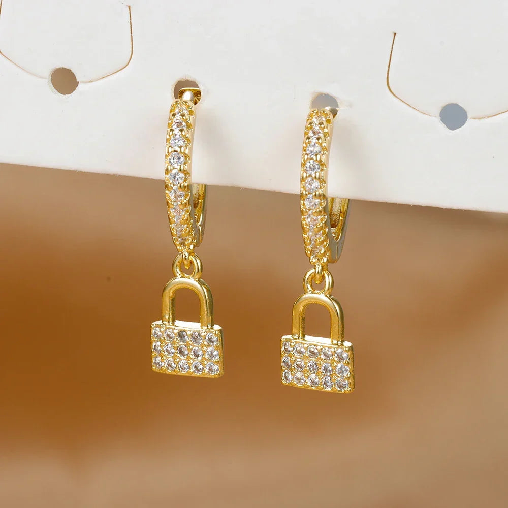 Boucles d'oreilles créoles clef et cadenas avec strass or