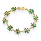 Bracelet avec breloques de palmiers en émail vert
