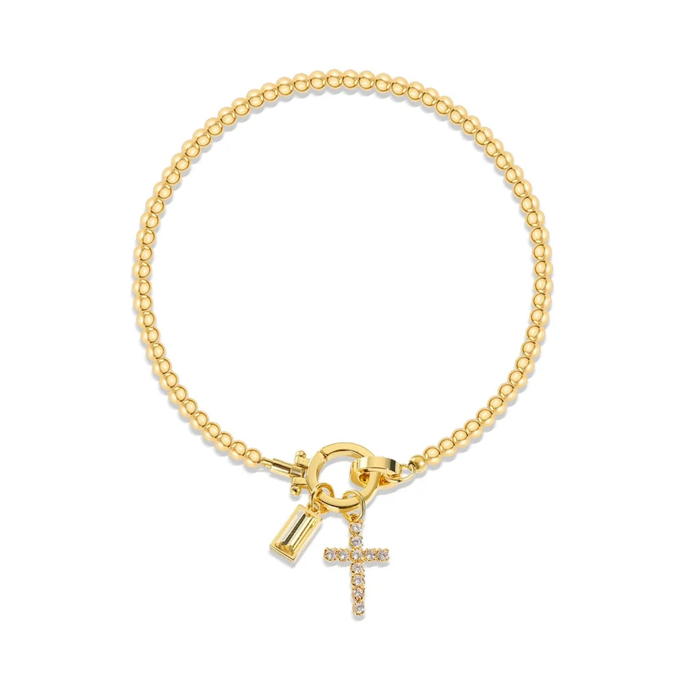 Bracelet avec croix et pierre de naissance