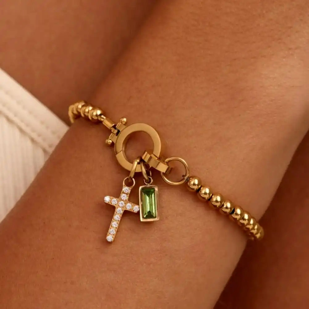 Bracelet avec croix et pierre de naissance décembre