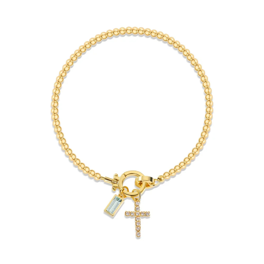 Bracelet avec croix et pierre de naissance