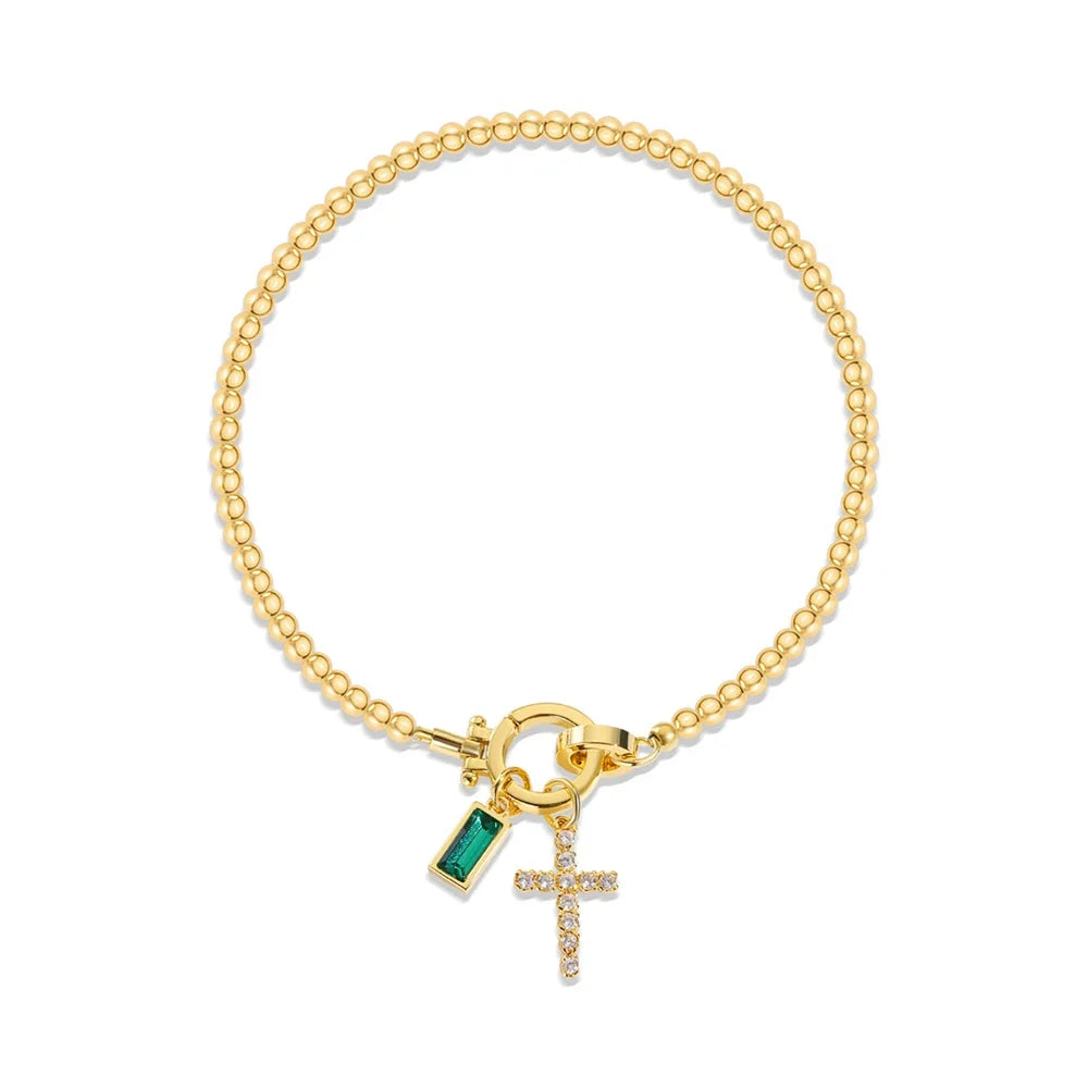 Bracelet avec croix et pierre de naissance