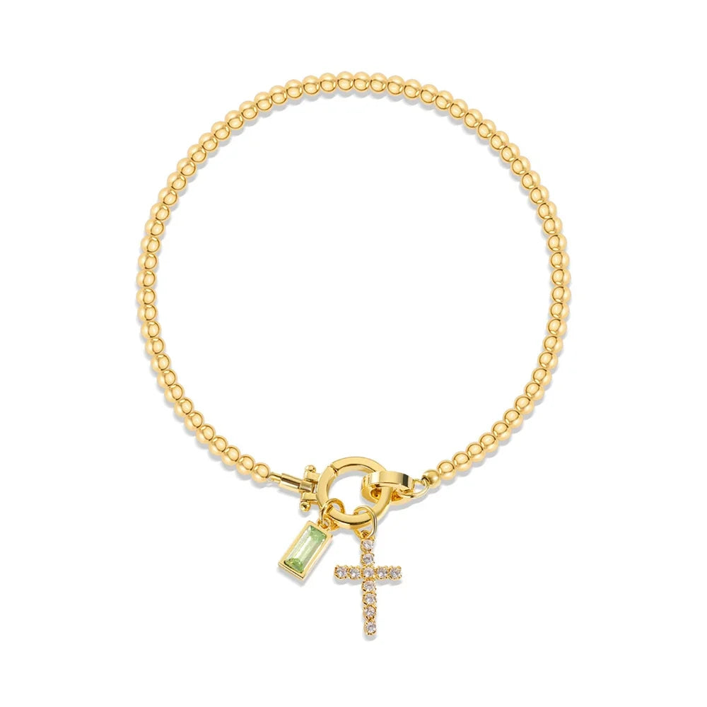 Bracelet avec croix et pierre de naissance