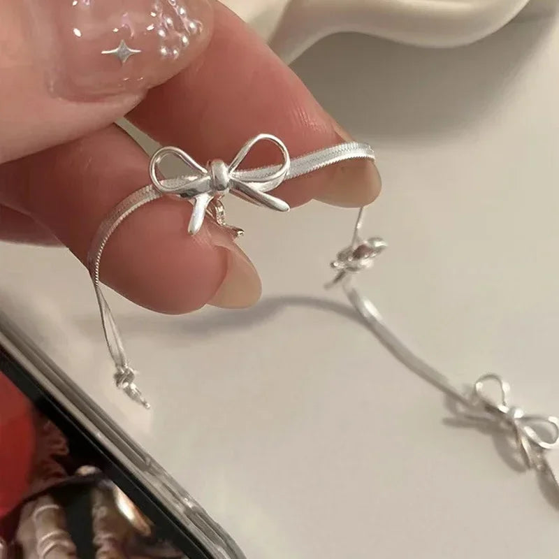 Bracelet avec noeud papillon pour femme argent