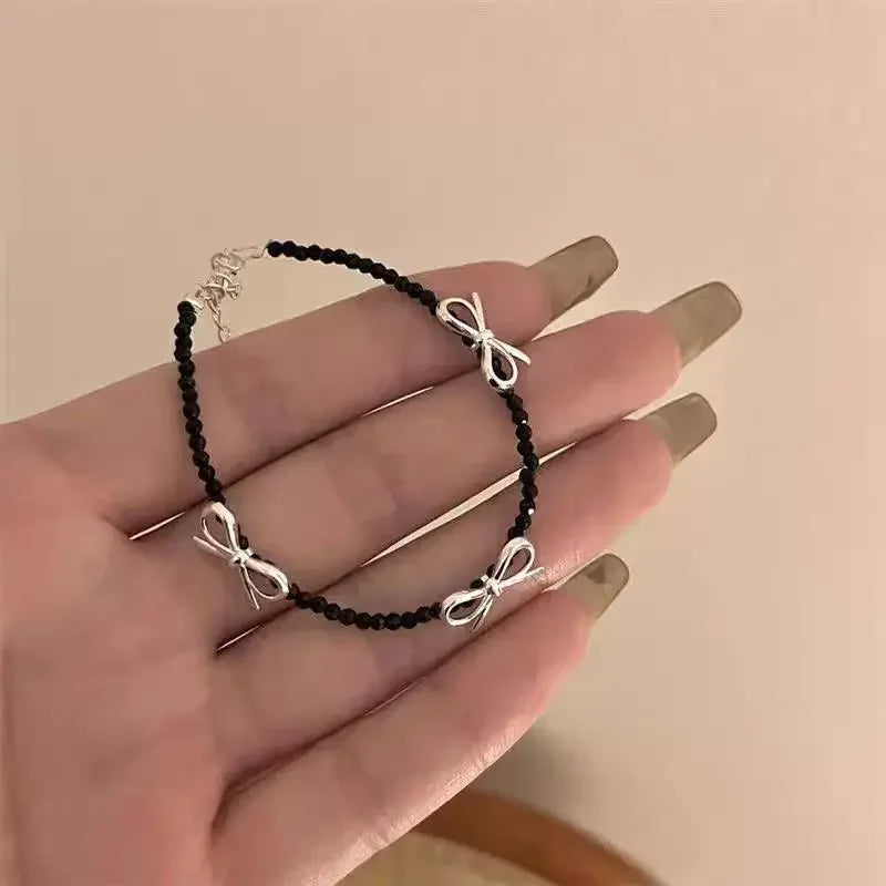 Bracelet avec noeud papillon pour femme noir