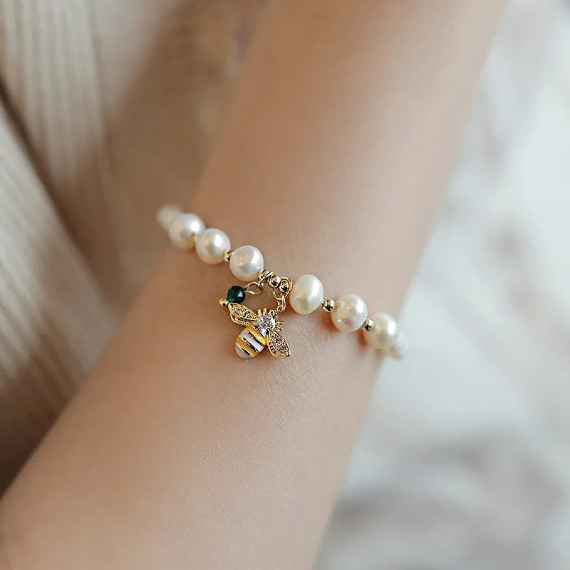 White beaded bee bracelet 