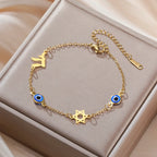 Bracelet avec symboles de protection oeil bleu, Chai et l'étoile de David or