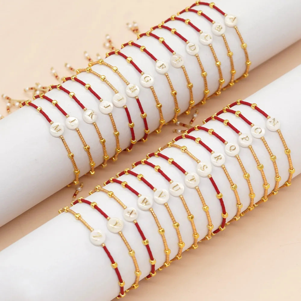 Bracelet bicolore initiale