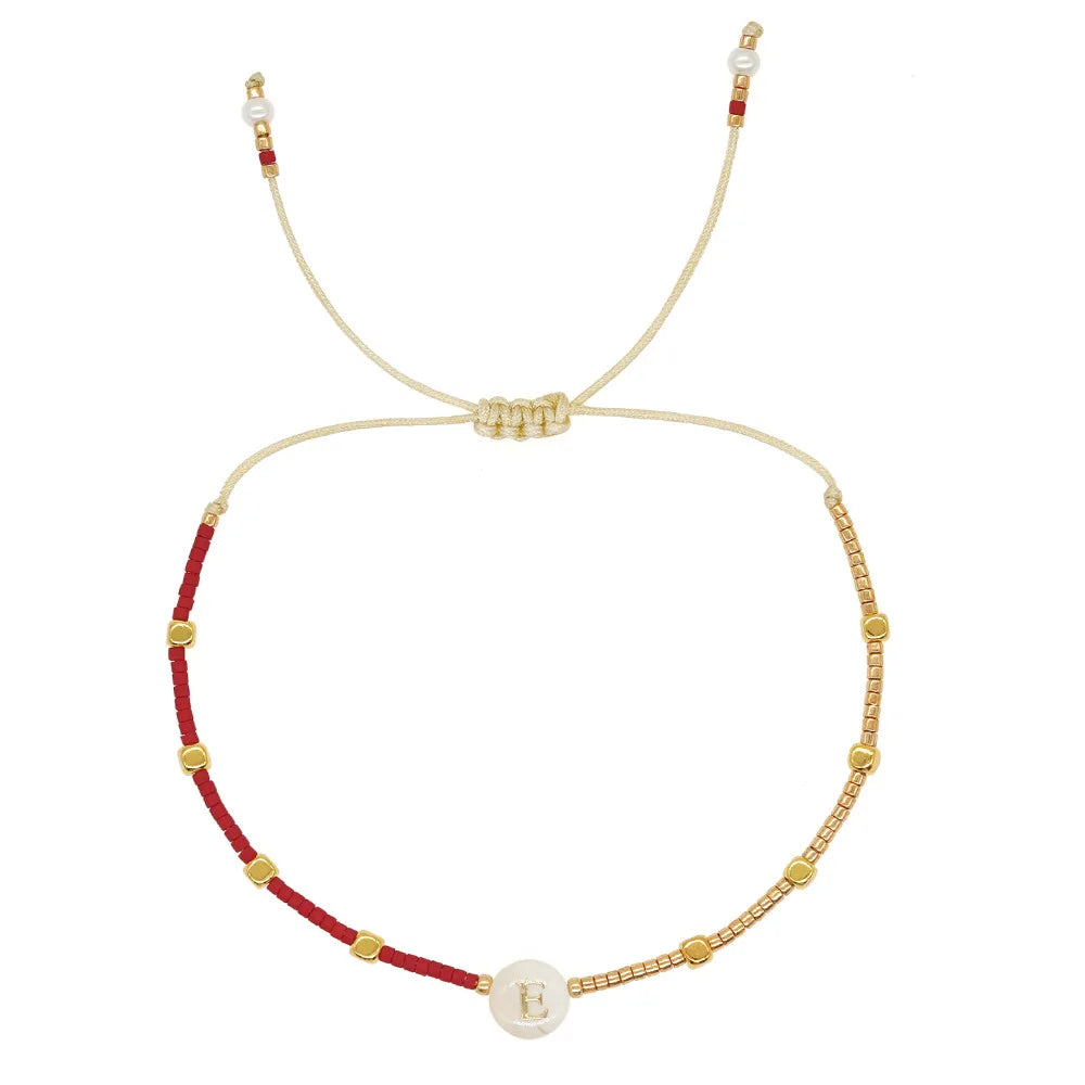 Bracelet bicolore initiale e