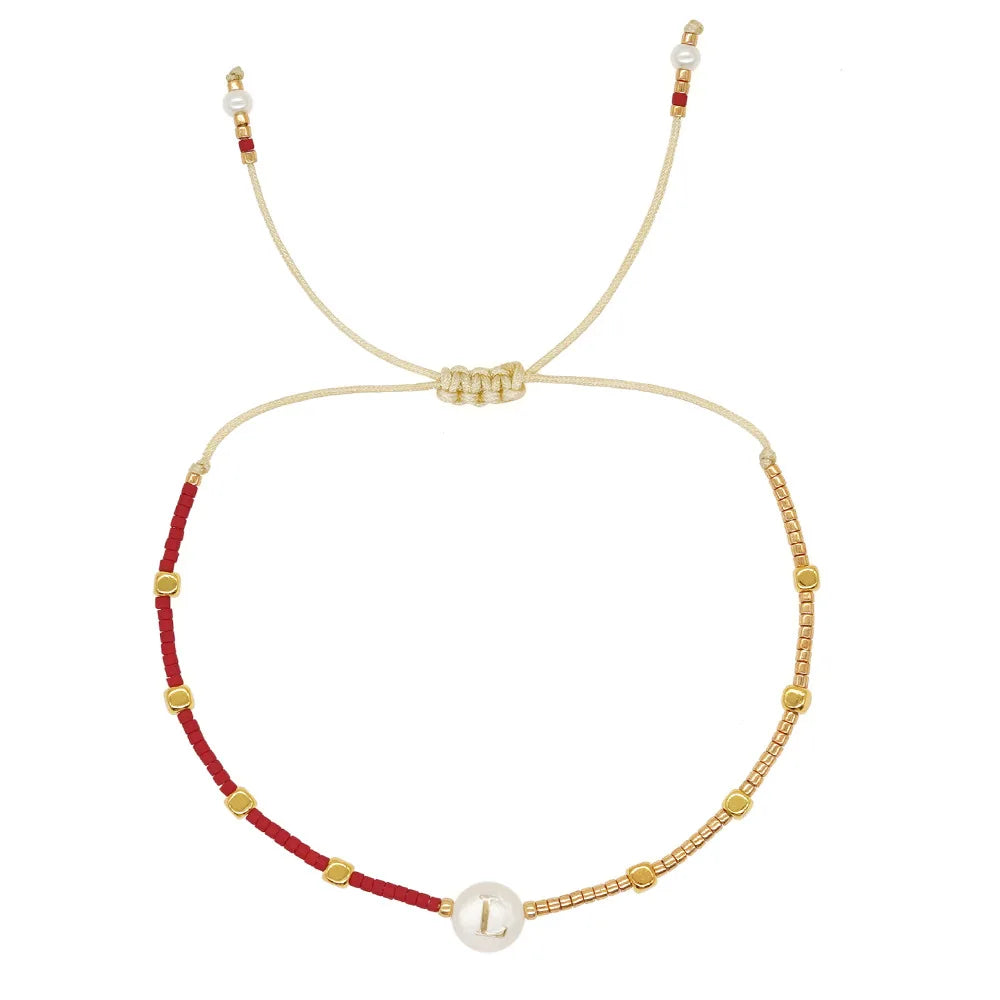 Bracelet bicolore initiale l
