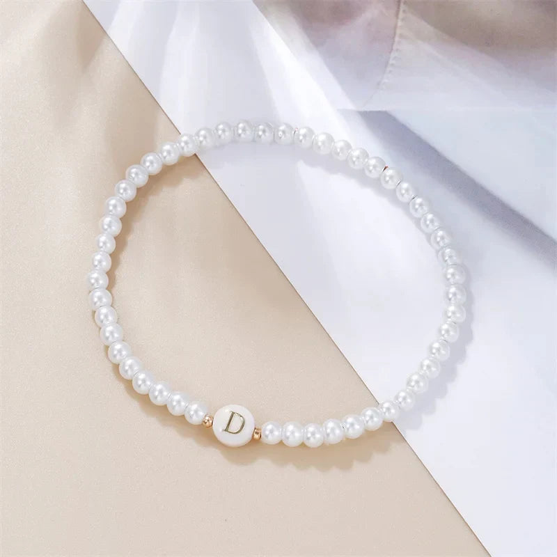 Bracelet blanc initiale d