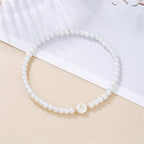 Bracelet blanc initiale a