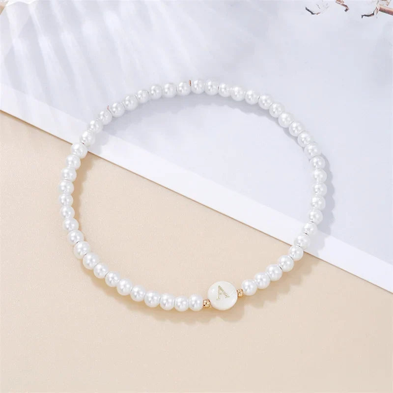 Bracelet blanc initiale a
