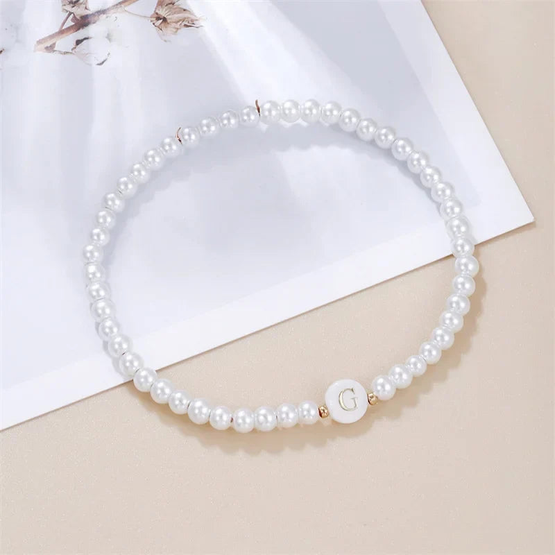 Bracelet blanc initiale g