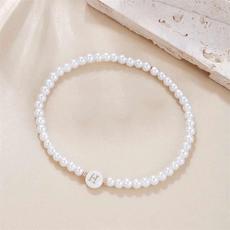 Bracelet blanc initiale h