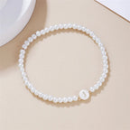 Bracelet blanc initiale j