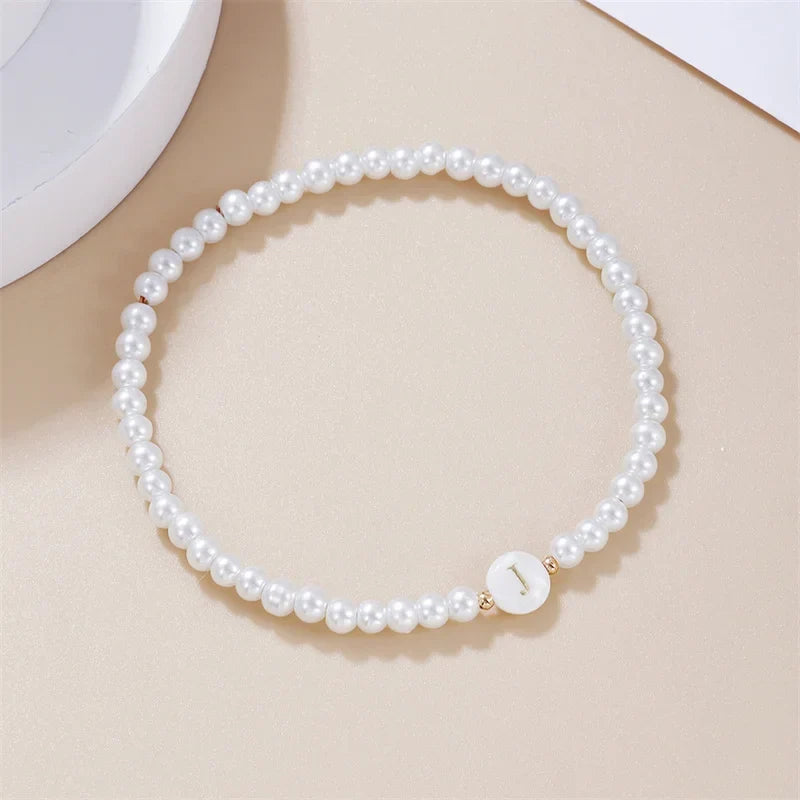 Bracelet blanc initiale j