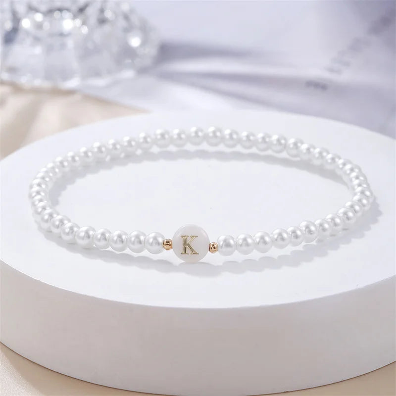 Bracelet blanc initiale k