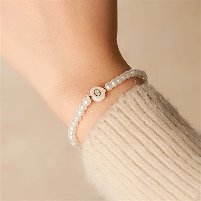 Bracelet blanc initiale o