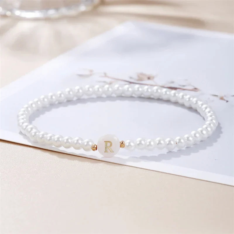 Bracelet blanc initiale r