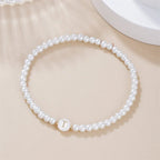 Bracelet blanc initiale t